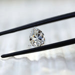 Angled view of pear moissanite showing facet brilliance