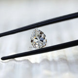 Angled view of pear moissanite showing facet brilliance