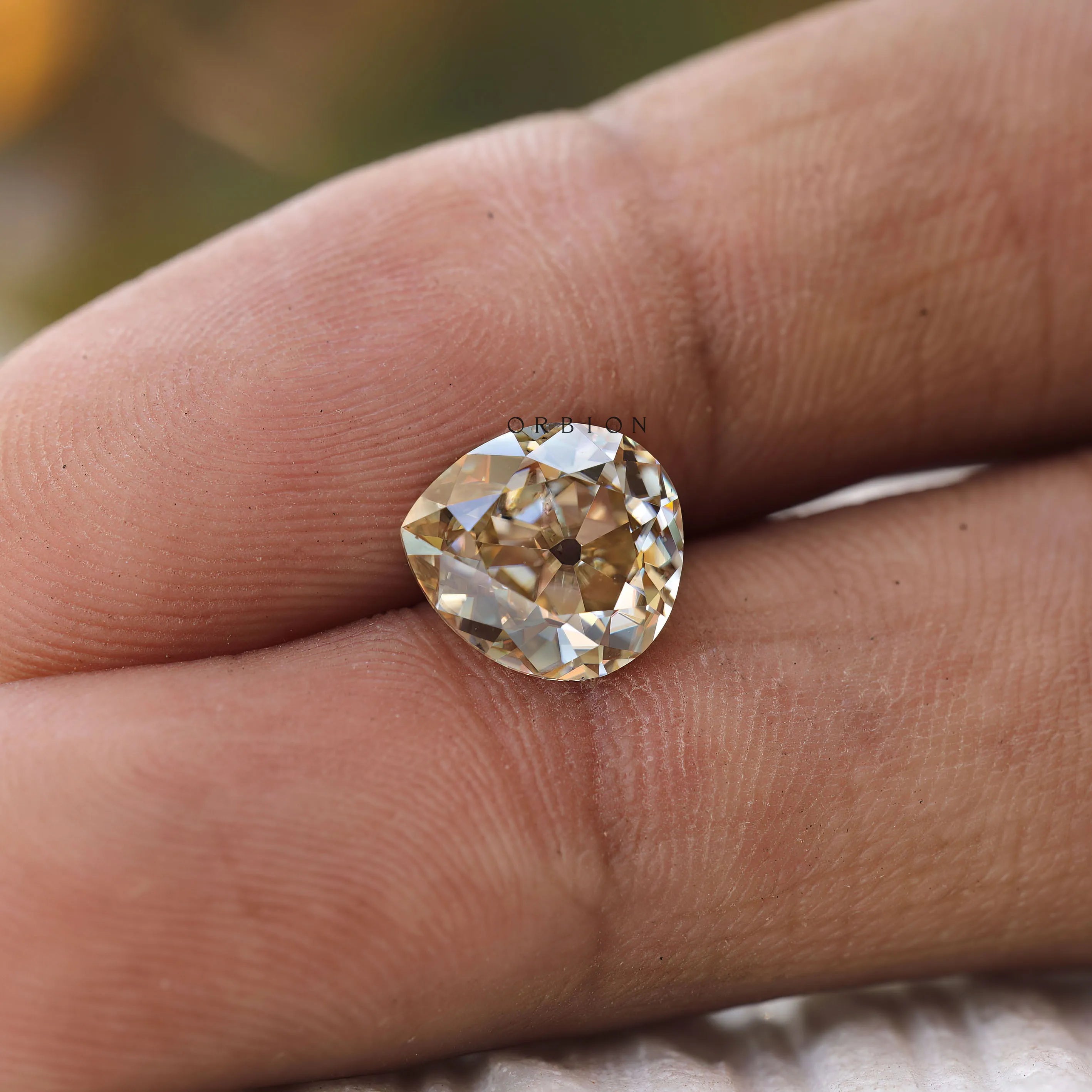 Antique style fat pear moissanite 3 ct in light champagne color