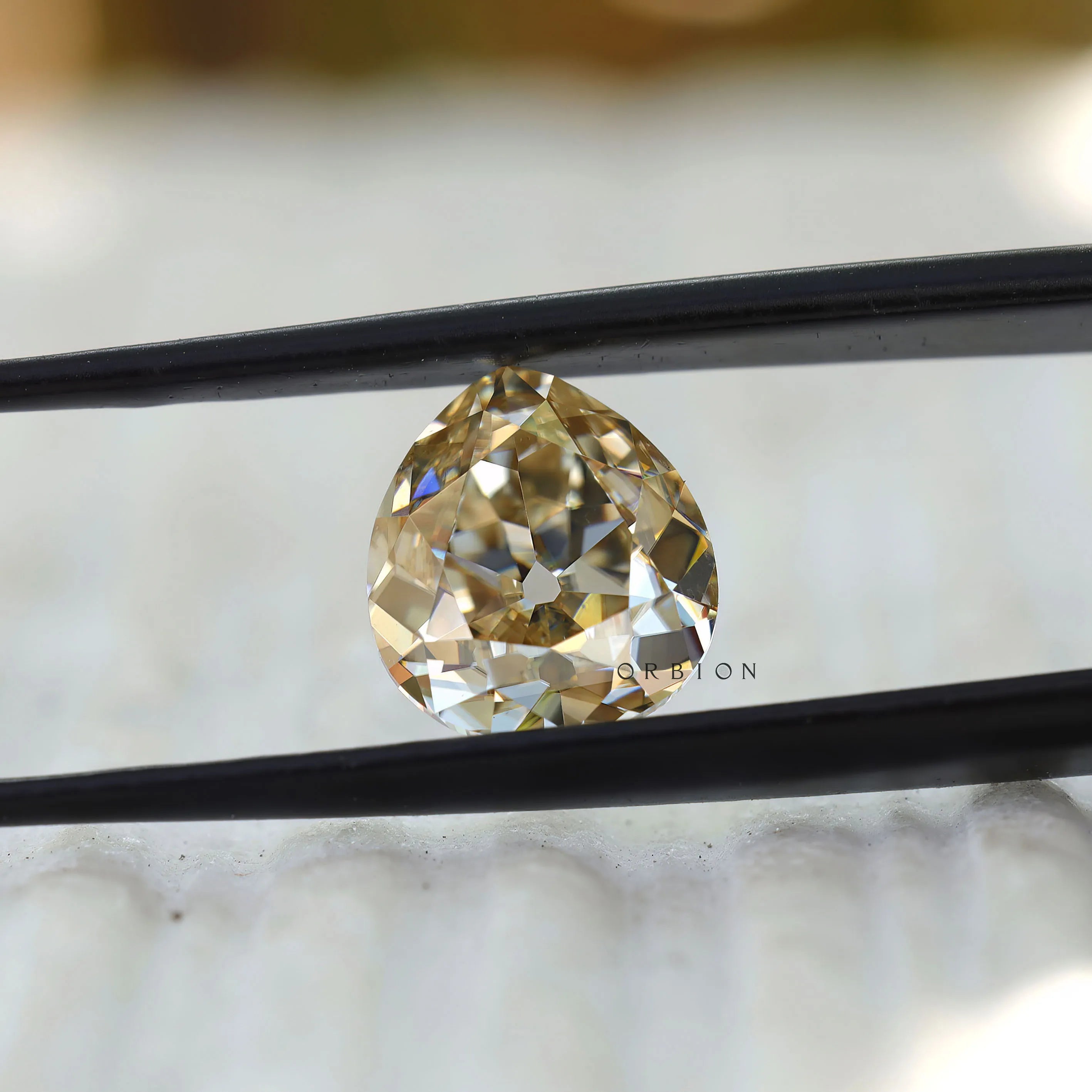Pear shape champagne moissanite 3 ct antique old mine cut stone