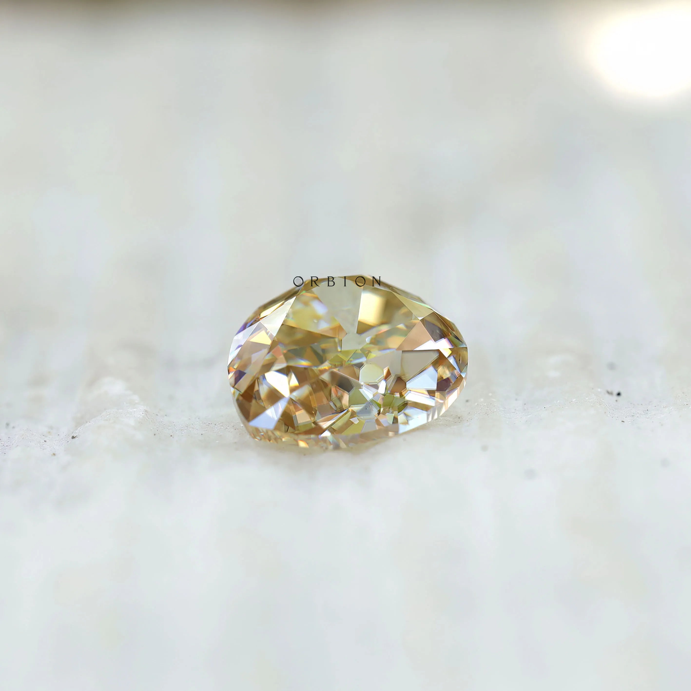 3 ct Light champagne pear moissanite with vintage old mine faceting
