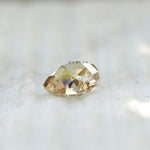 Chunky pear moissanite 3 ct in soft champagne tone antique cut