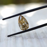 Pear shaped moissanite 2.80 ct in pale champagne tone antique faceting