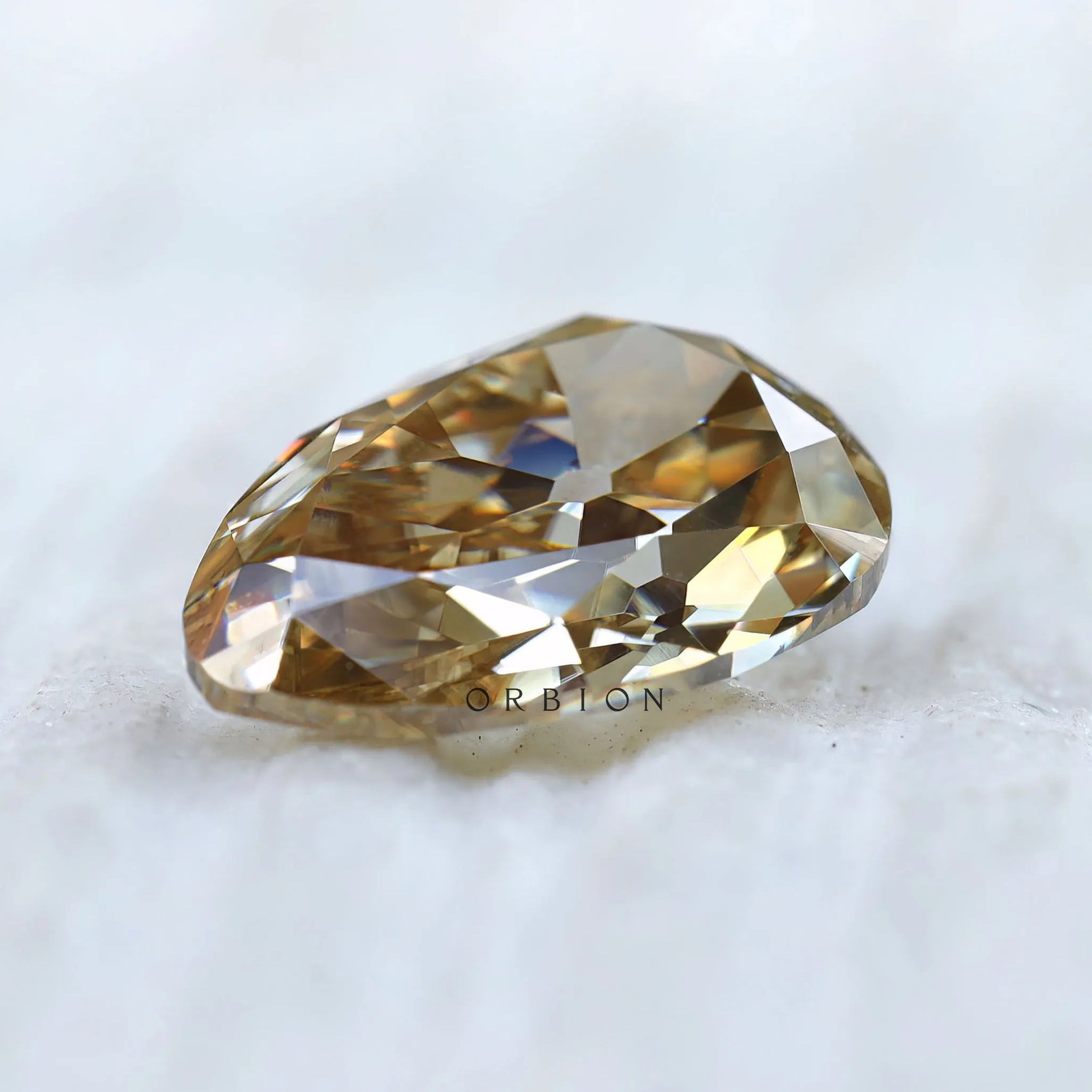 Old mine cut pear moissanite angled brilliance view