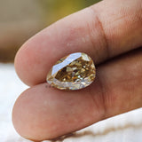 Old mine cut pear moissanite warm tone reflection