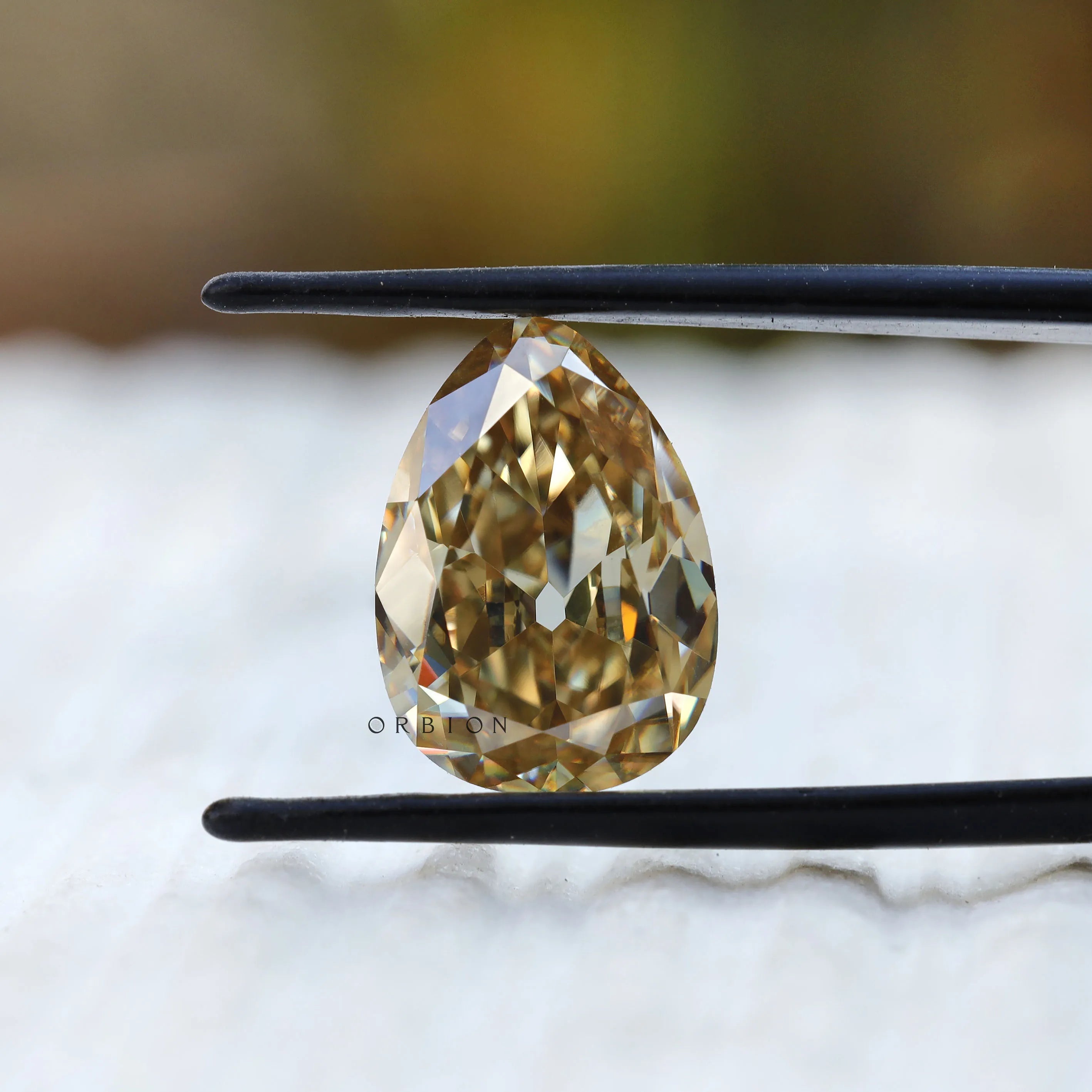 Pear shaped yellow moissanite loose