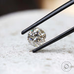 Off white round moissanite 1.40 ct vintage old european cut stone