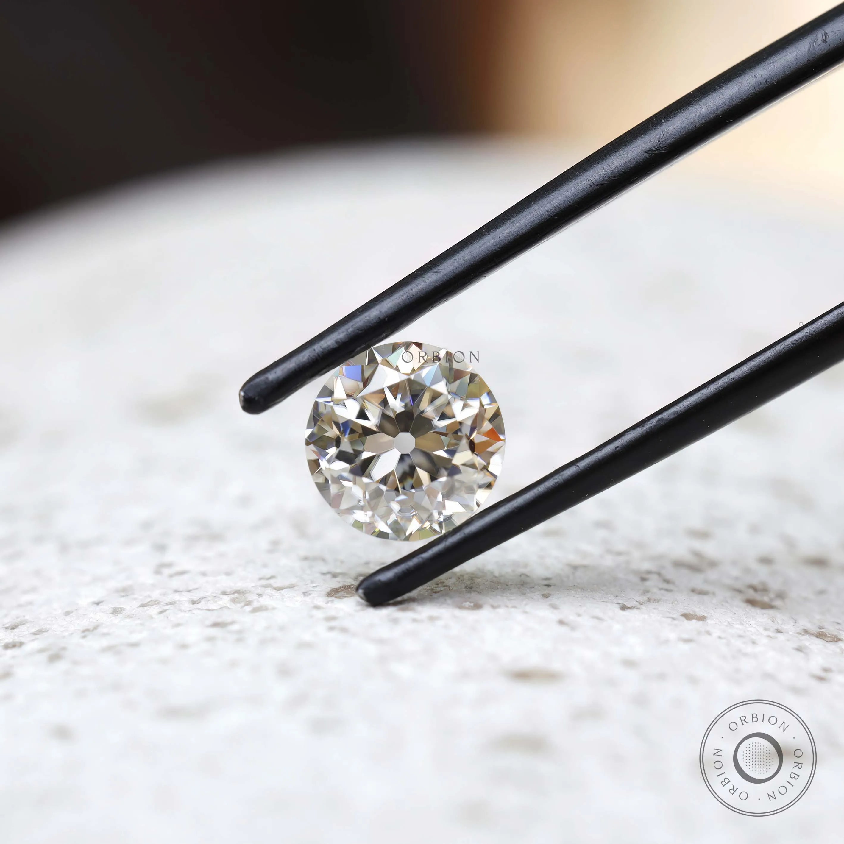 1.40 ct Loose off white moissanite with classic OEC round shape
