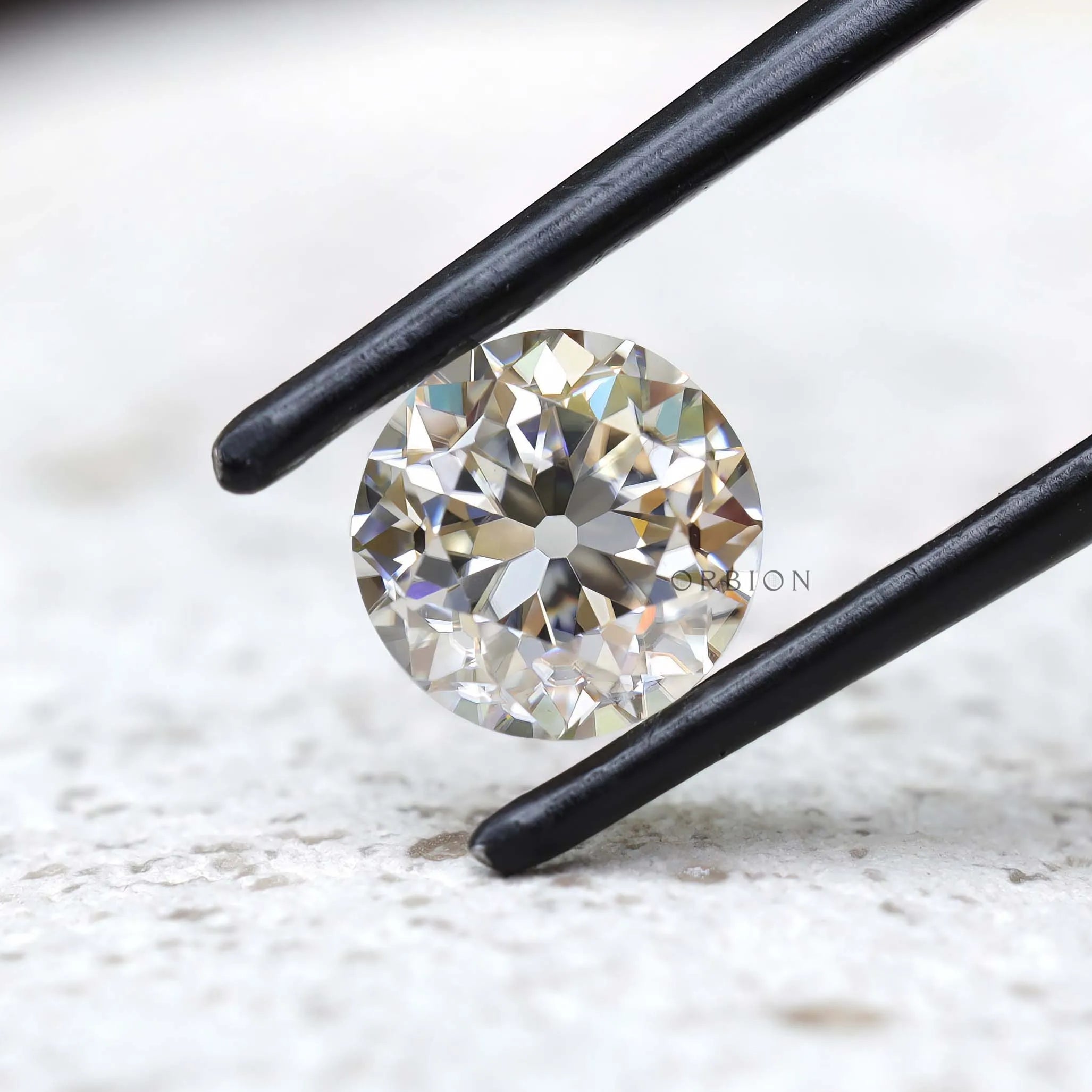 Round moissanite 1.40 ct off white tone old european cut brilliance