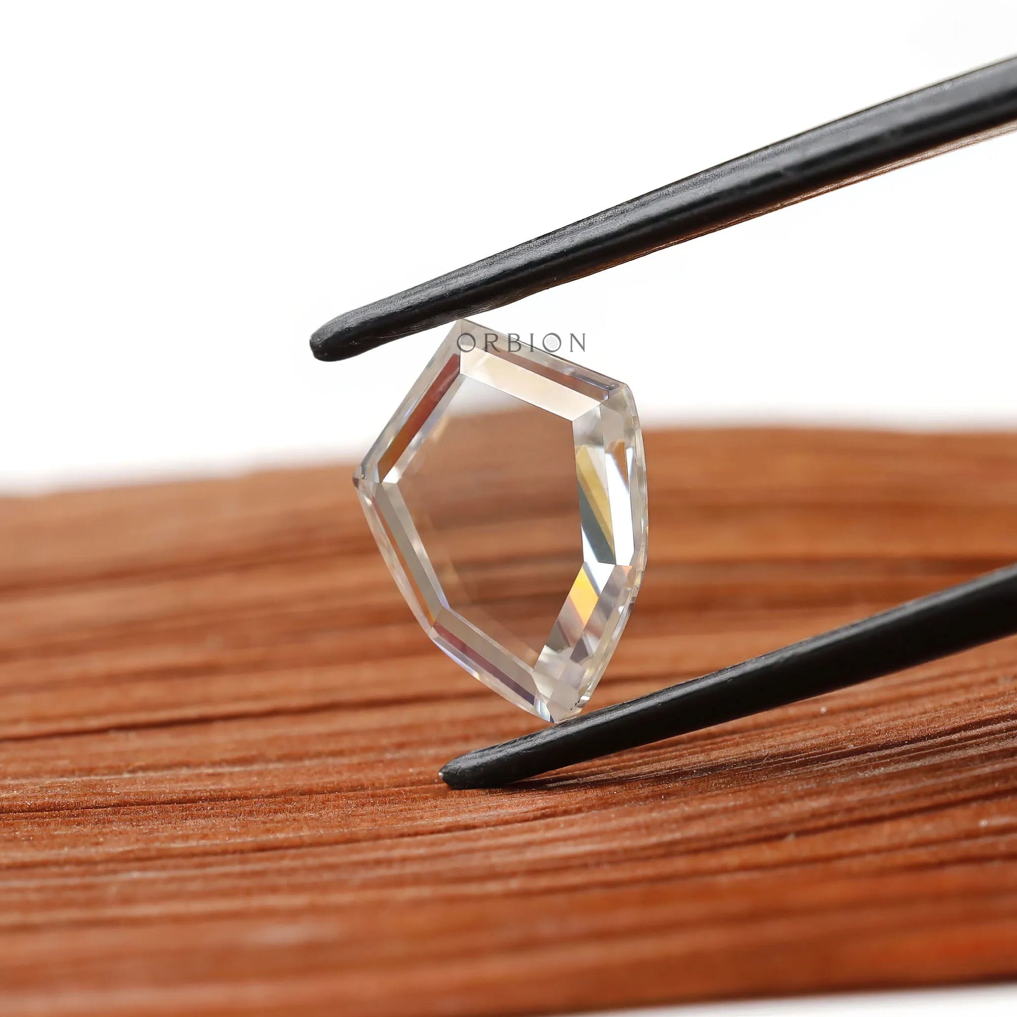 2.60 ct shield shaped portrait cut moissanite flat cut gemstone