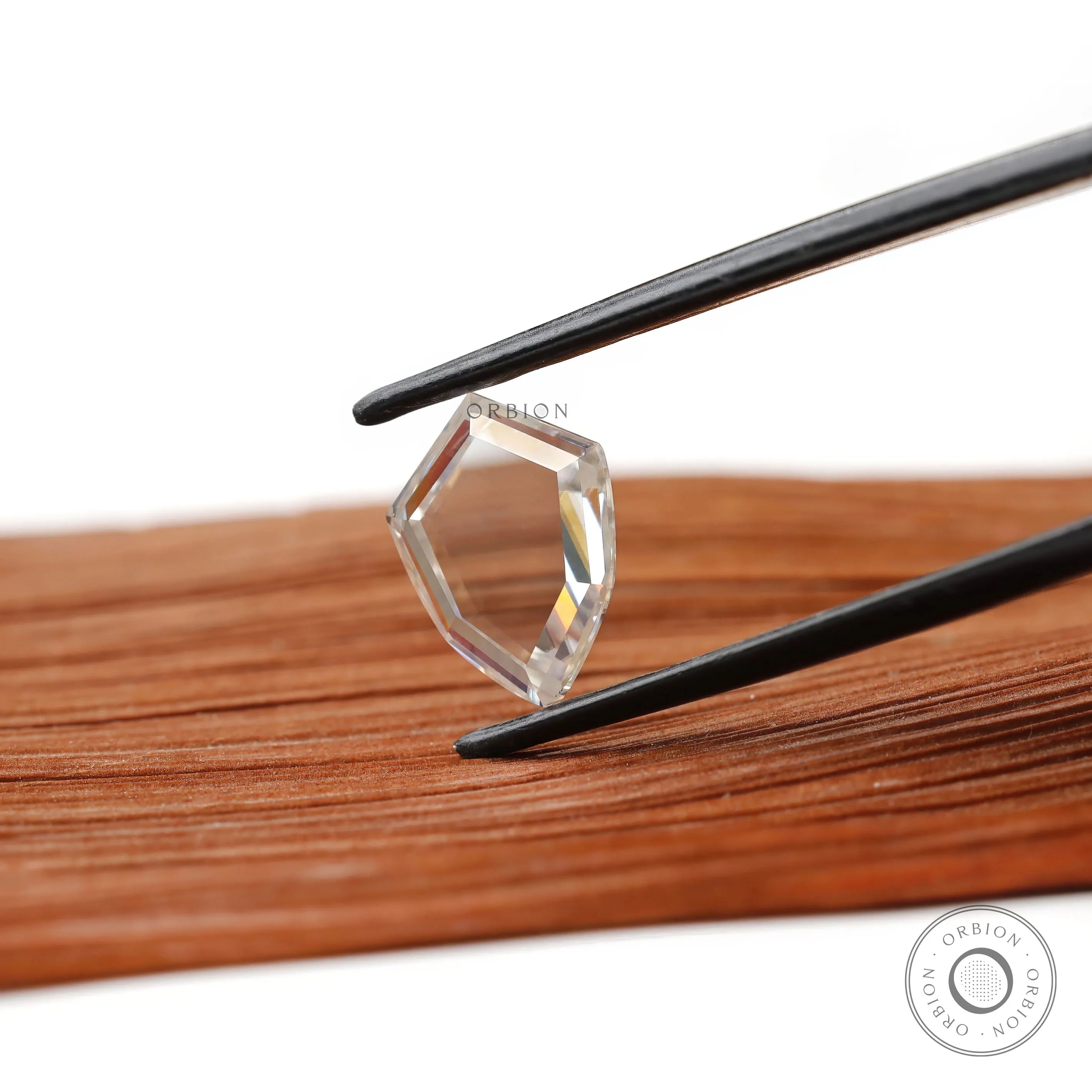 2.60 ct shield shaped portrait cut moissanite flat cut gemstone