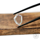 Colorless moissanite shield shape portrait cut stone