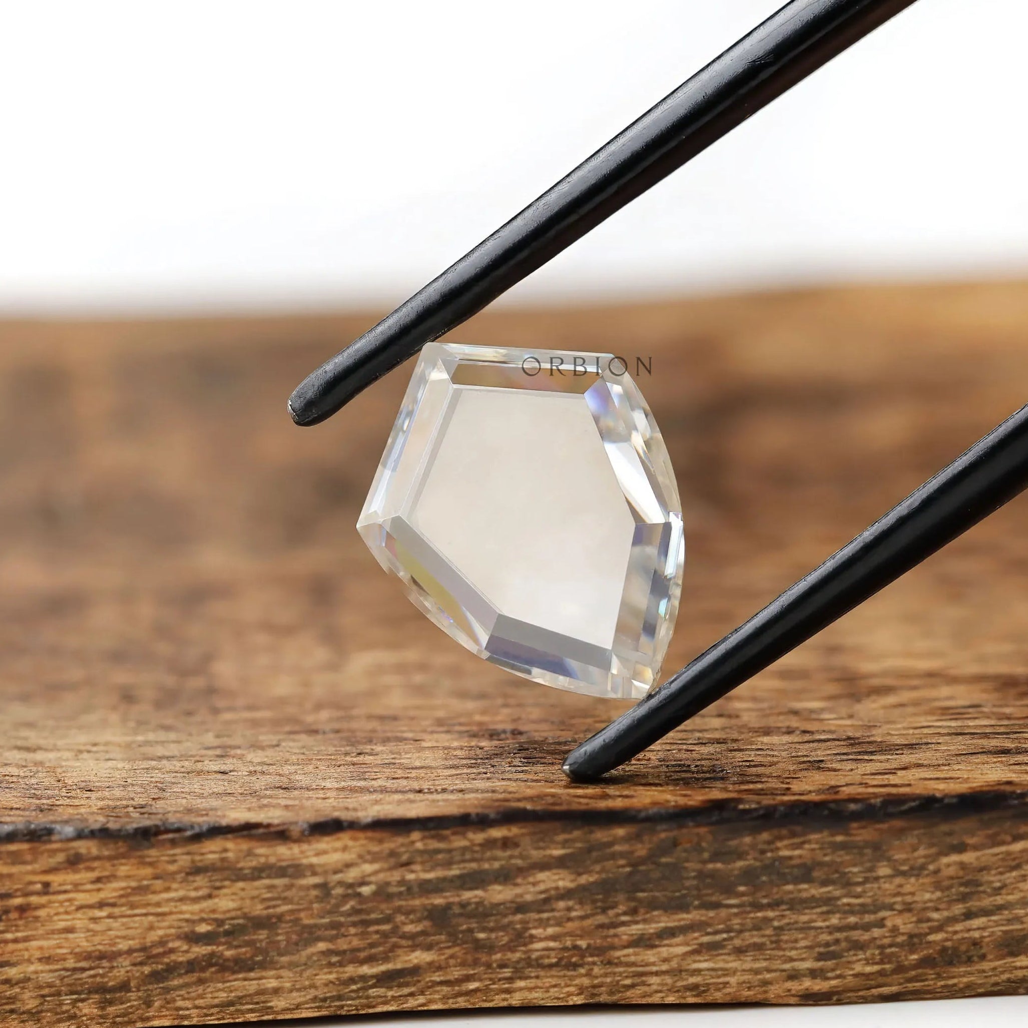 Portrait cut shield shaped moissanite loose gemstone