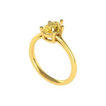 Side view of pear champagne moissanite split shank solitaire ring in yellow gold