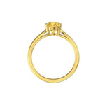 Minimalist pear moissanite engagement ring in yellow gold