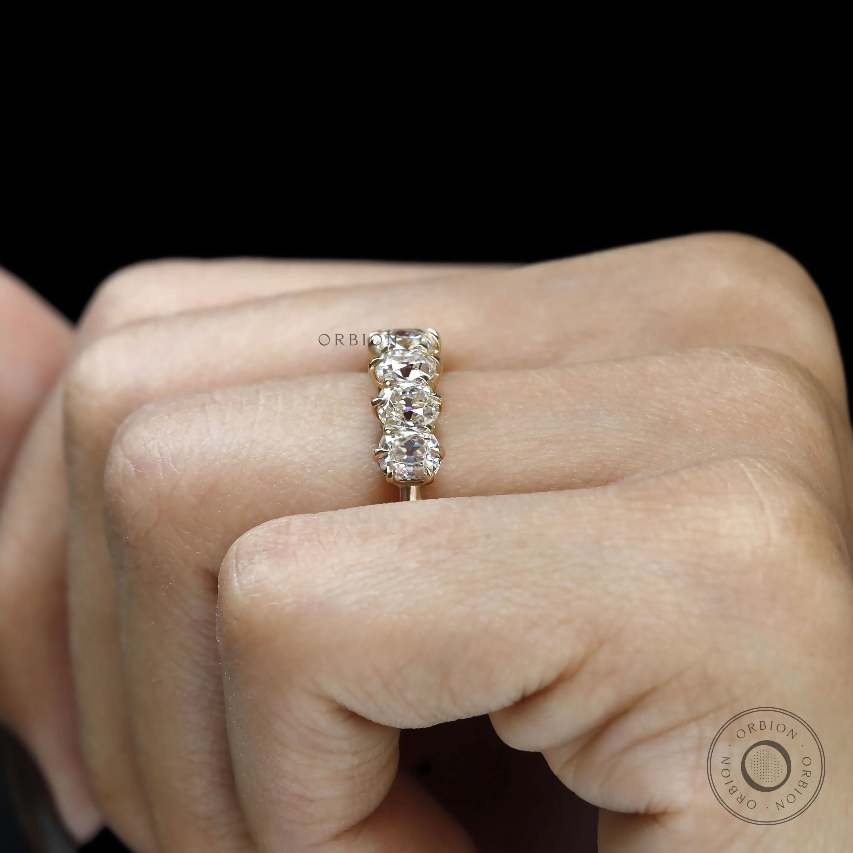 Vintage-inspired seven stone cushion moissanite wedding band, old mine cut, yellow gold half eternity ring