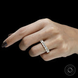Yellow gold half eternity wedding band with seven cushion moissanite stones, old mine cut