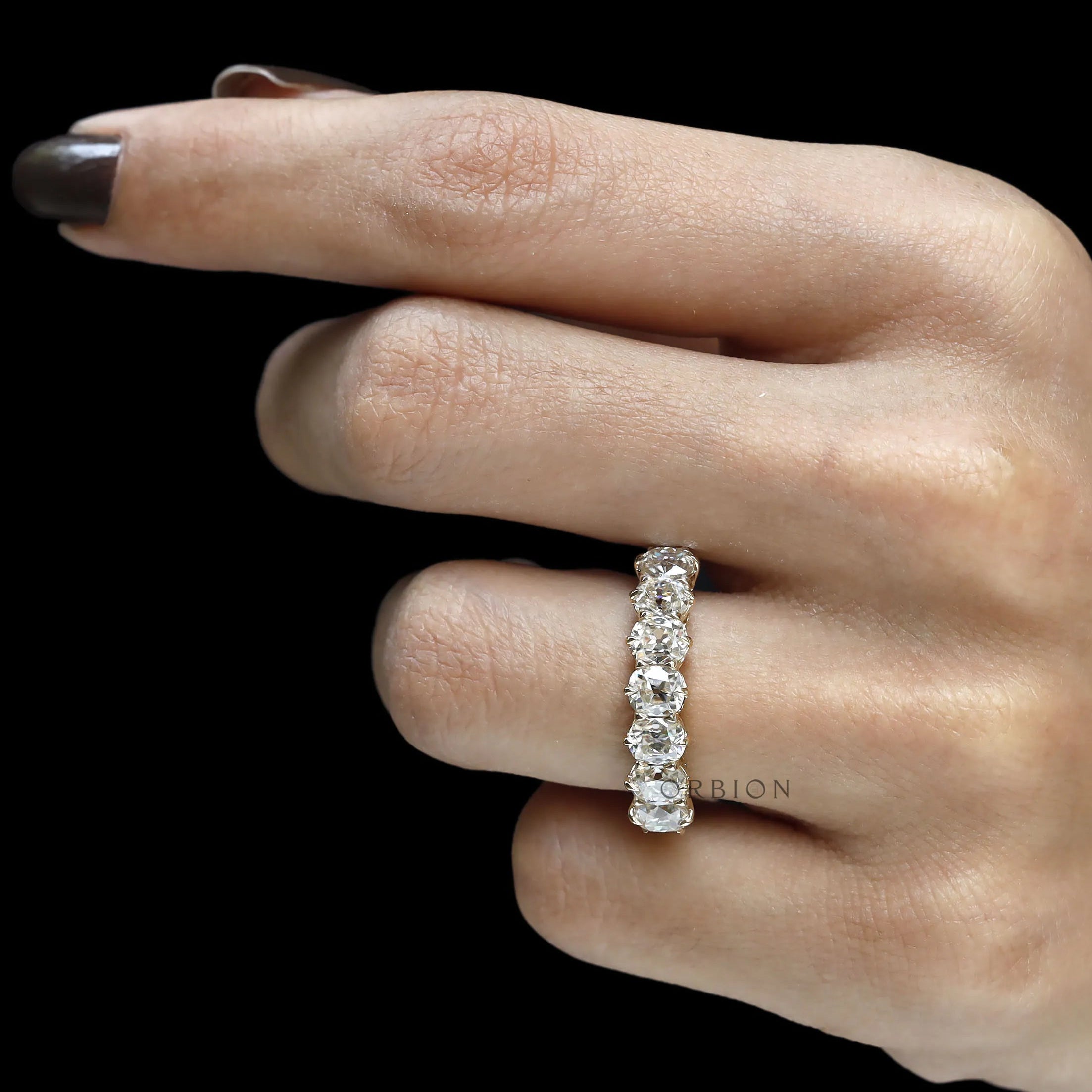 Seven stone moissanite wedding band, old mine cut, cushion cut stones in yellow gold half eternity setting