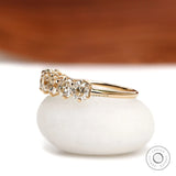 Classic seven stone cushion moissanite wedding band in yellow gold, old mine cut, half eternity setting