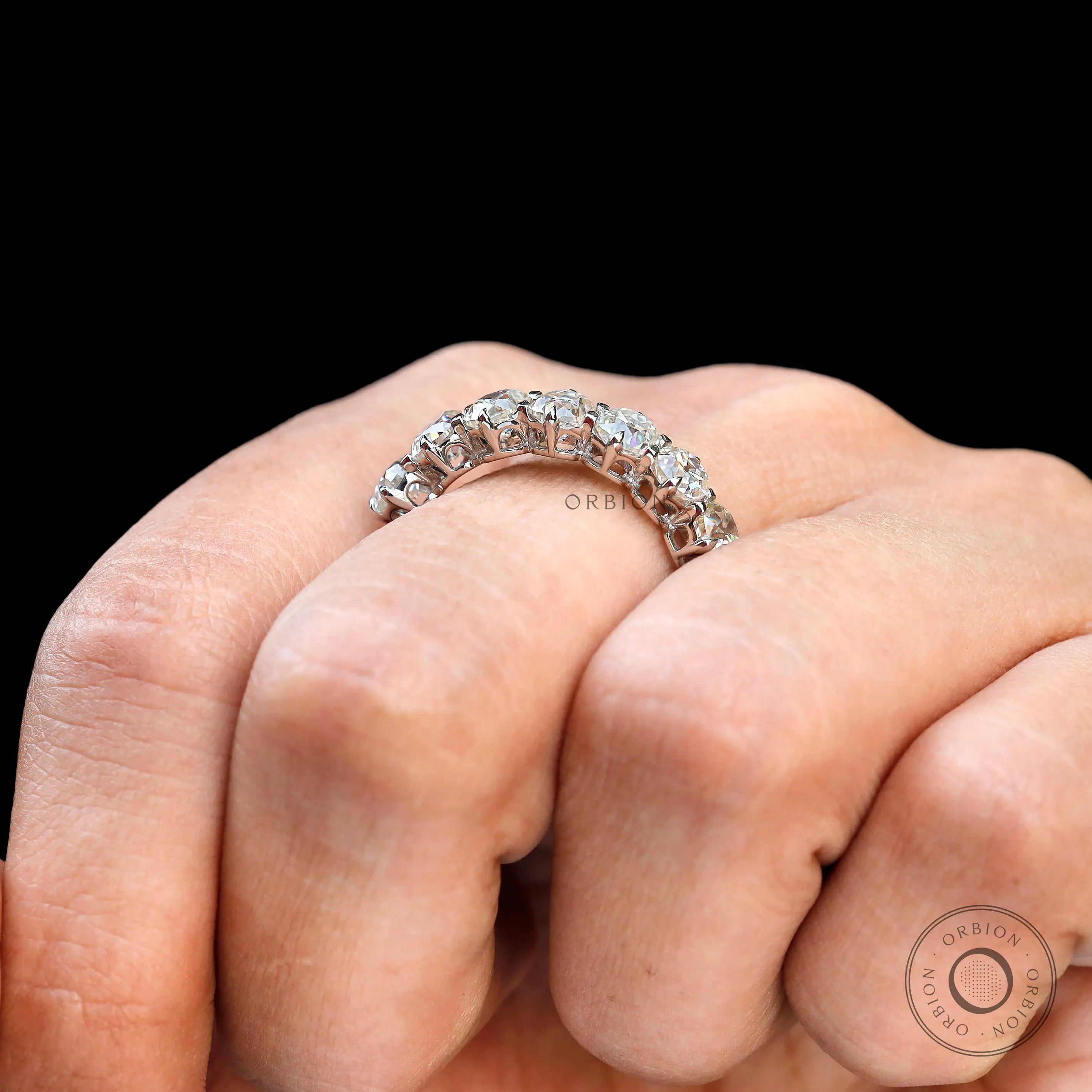 White gold old mine cut cushion moissanite ring on hand
