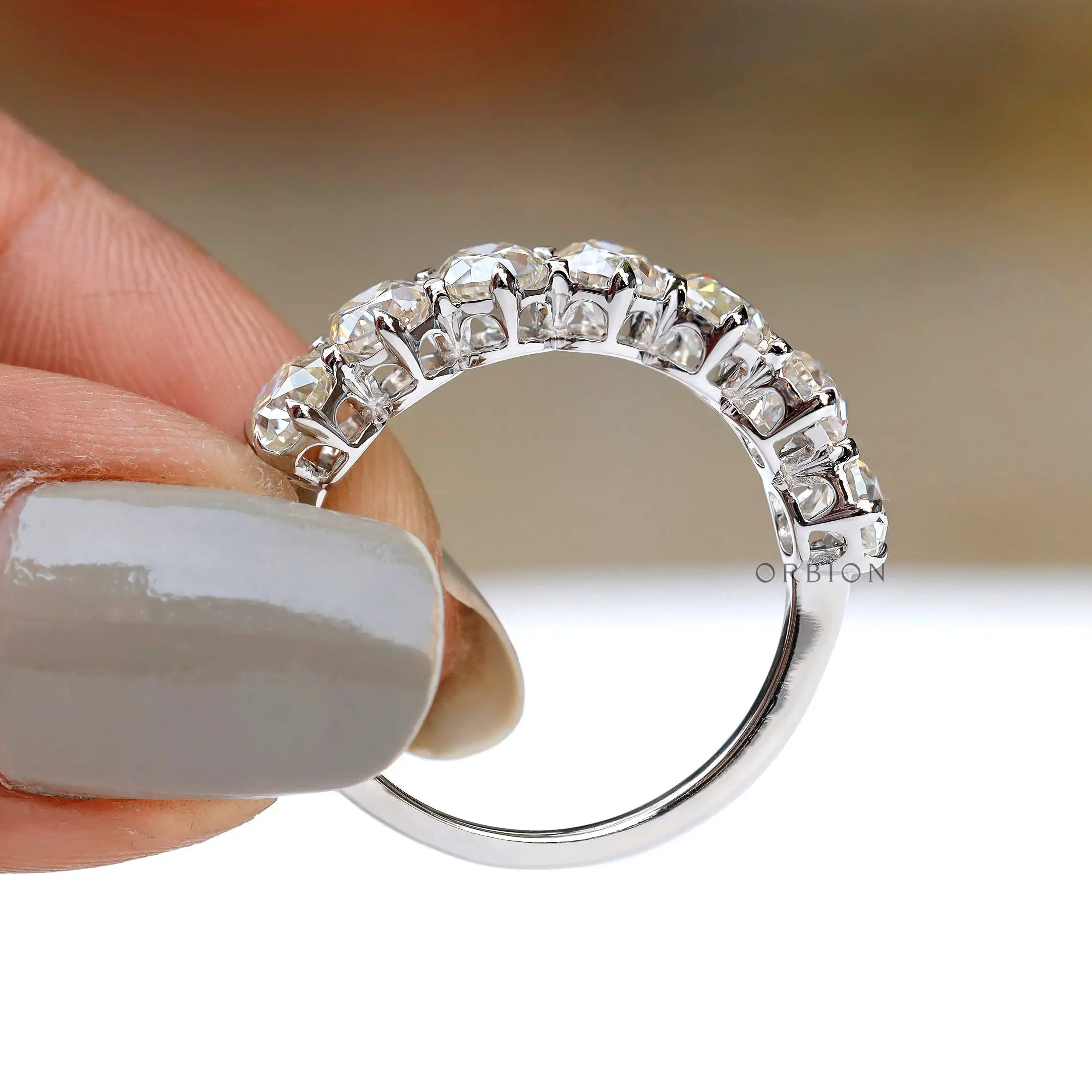 White gold moissanite or lab diamond anniversary band detailed view