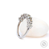 Seven stone moissanite band with glossy white gold finish