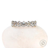 Seven stone old mine cut cushion moissanite wedding band in white gold