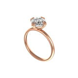 Angled view rose gold cushion solitaire on white background
