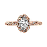 Oval cut lab diamond twisted pave halo engagement ring in 14k rose gold