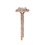 Vintage style oval halo engagement ring with twisted diamond band