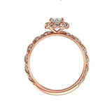 Oval cut diamond halo ring with pave twisted band rose gold