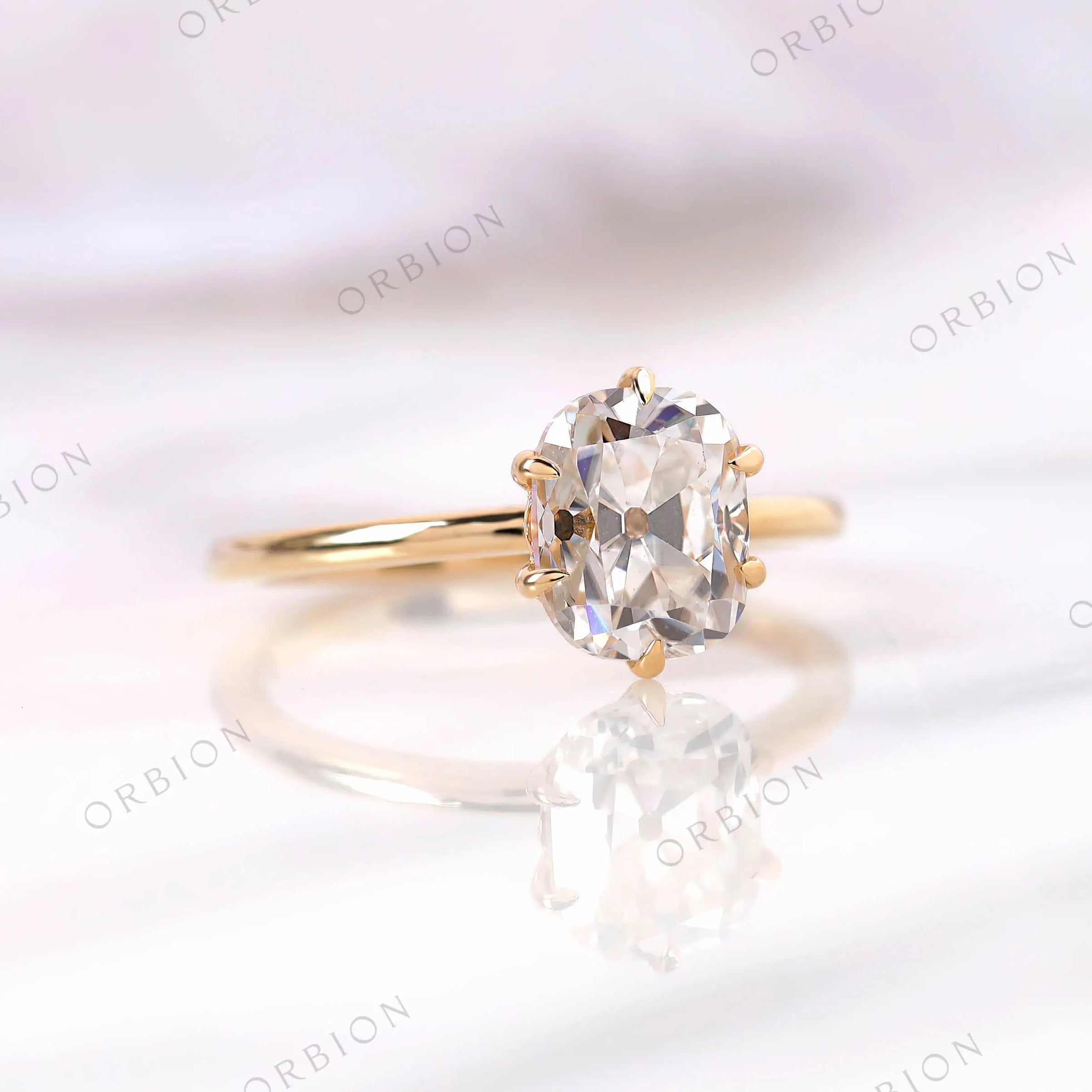 Side profile of elongated cushion solitaire 6 prong ring