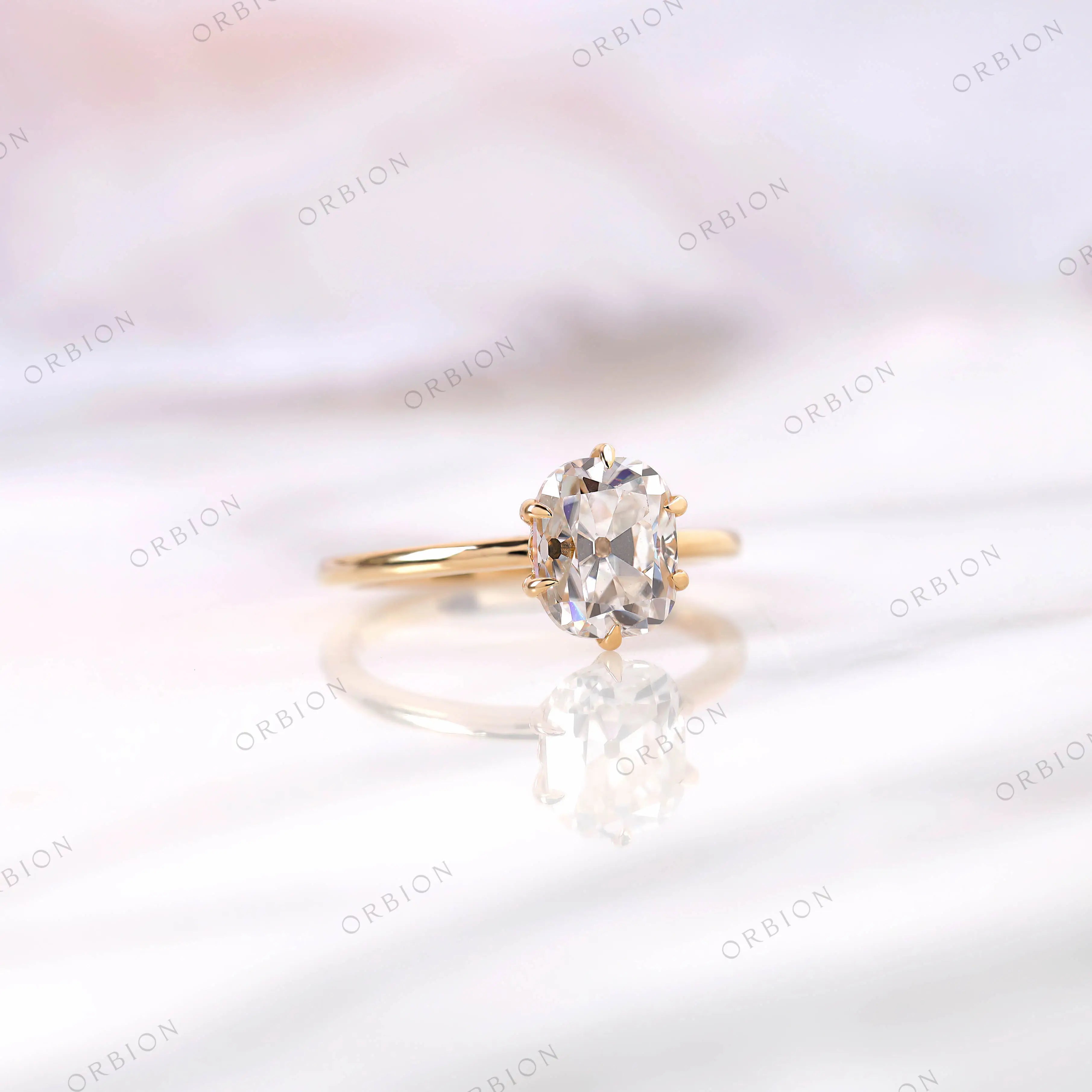 Side profile of elongated cushion solitaire 6 prong ring