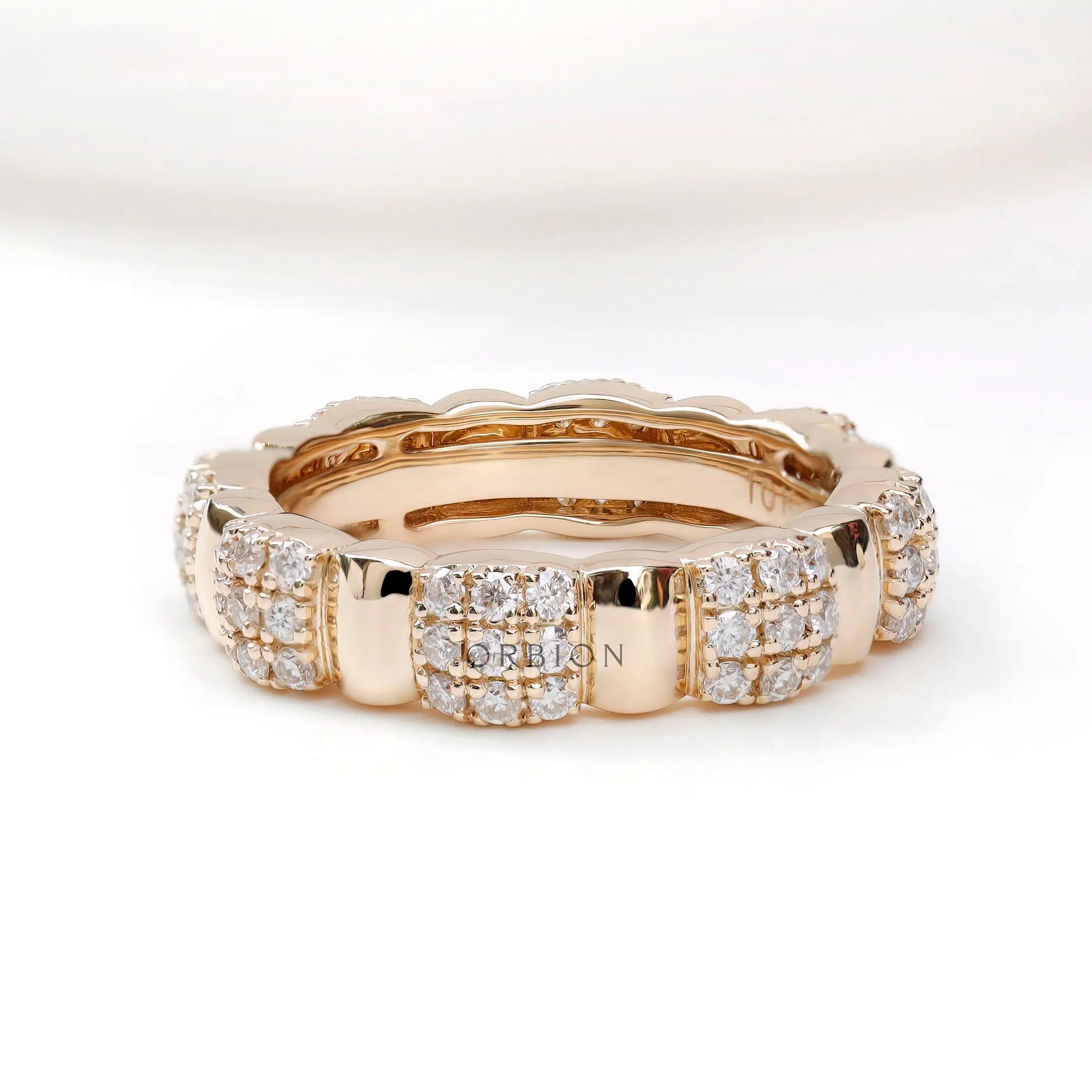 Thick station pave wedding band in 14K yellow gold