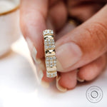 Wide yellow gold anniversary band with continuous sparkle