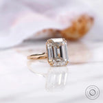 Large emerald cut lab diamond engagement ring with matching band