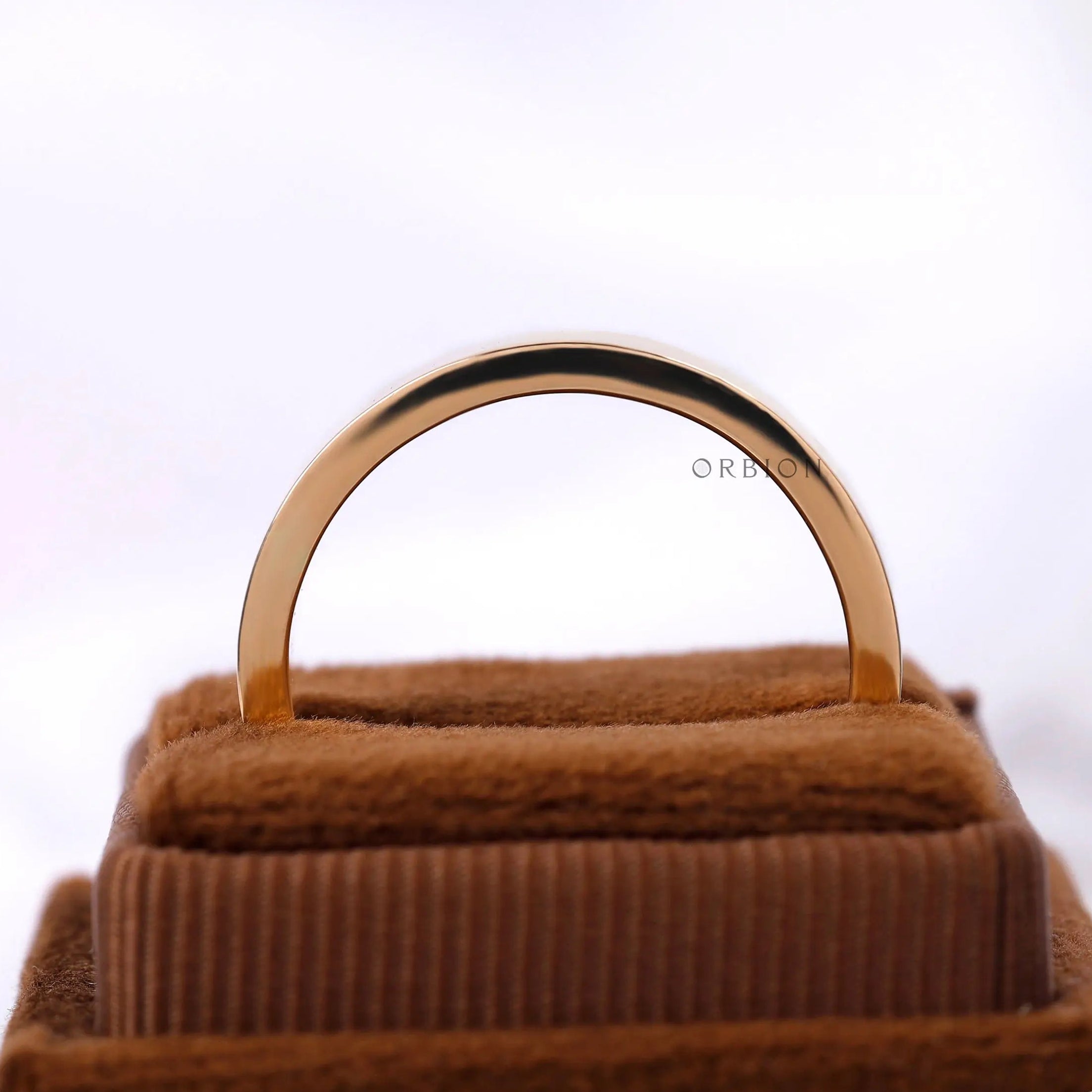 Side profile flat polished gold wedding band