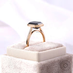 Black moissanite cathedral promise ring side view