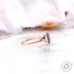 Emerald cut black stone ring polished gold
