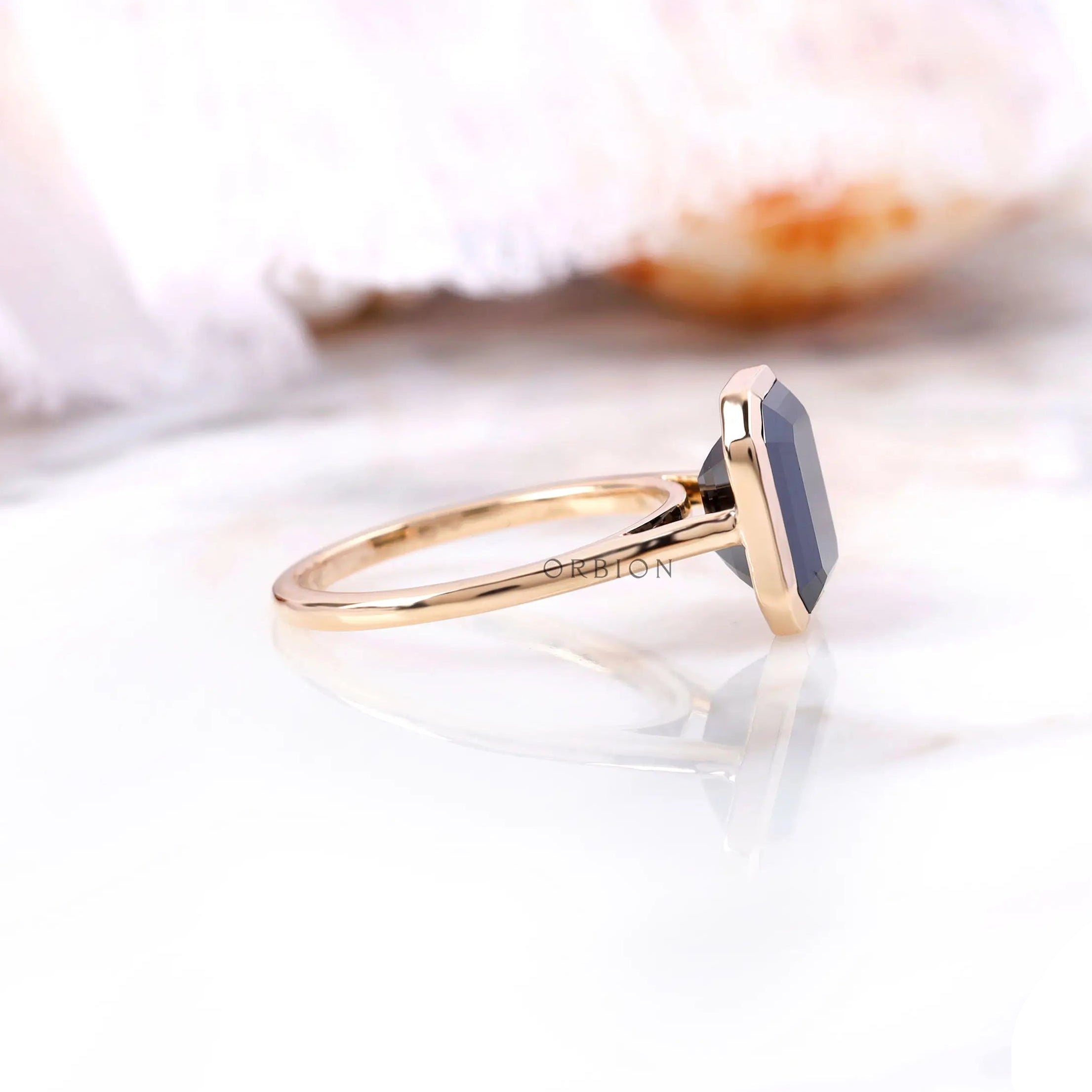 Emerald cut black stone ring polished gold
