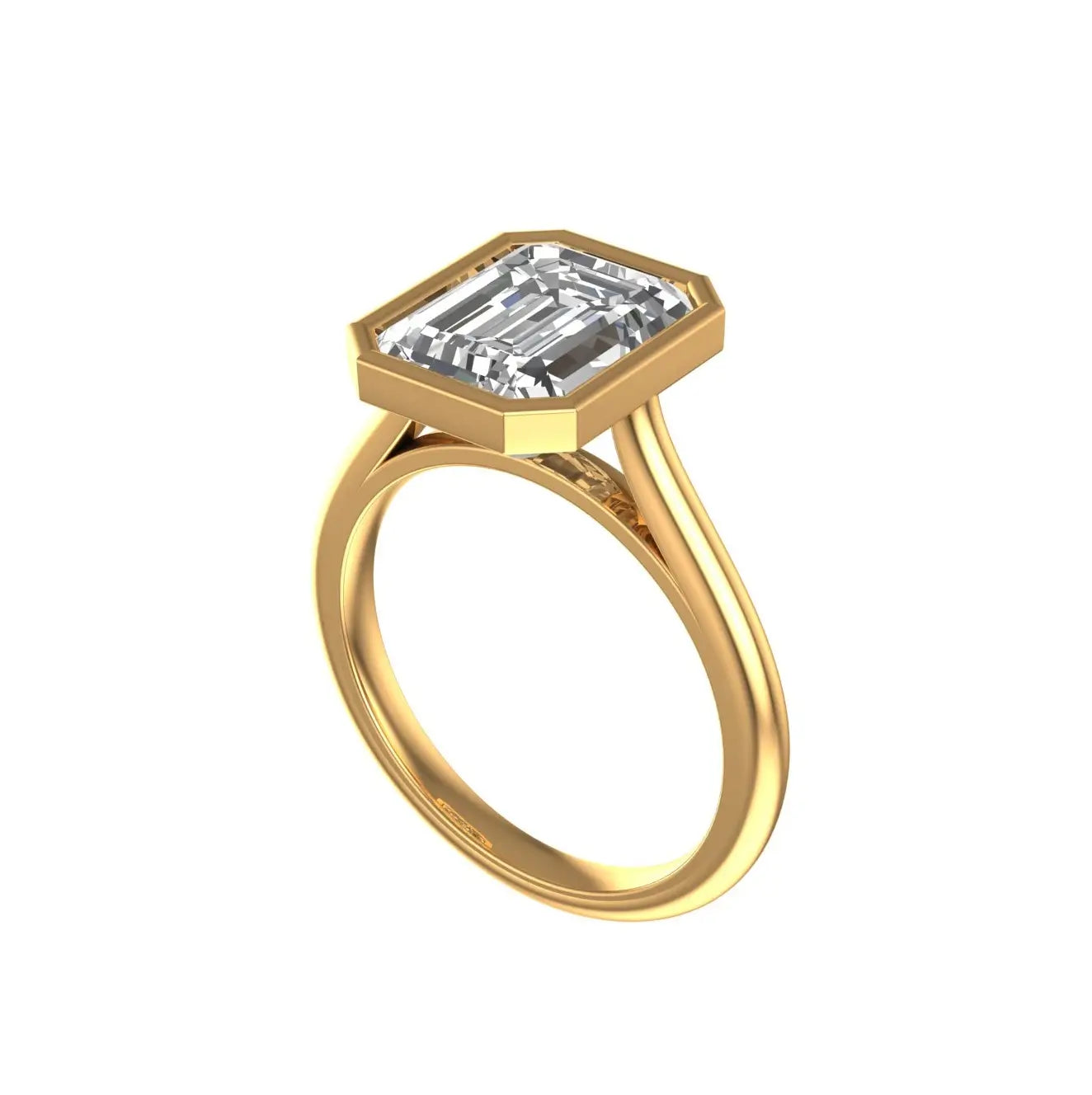 Bezel set emerald cut moissanite ring side profile in yellow gold