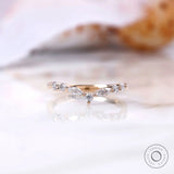 V-shaped chevron band with marquise and round moissanite accents