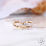 Back view of V-shaped half eternity moissanite band