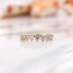 Heart shape half eternity band in yellow gold, straight-on sparkle view
