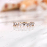 Heart shape half eternity band in yellow gold, straight-on sparkle view