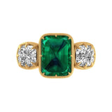Vintage emerald cut green moissanite three stone engagement ring in 14k yellow gold