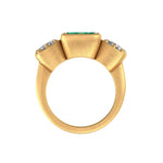 trilogy emerald moissanite ring with brushed matte gold band