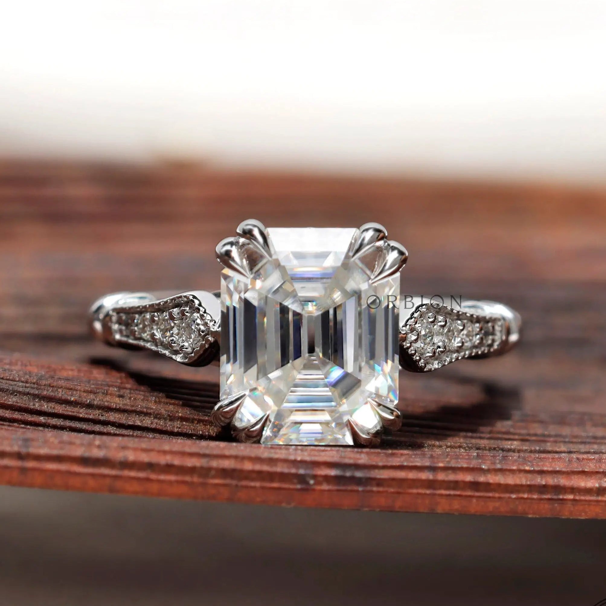 Vintage emerald cut engagement ring with milgrain detail