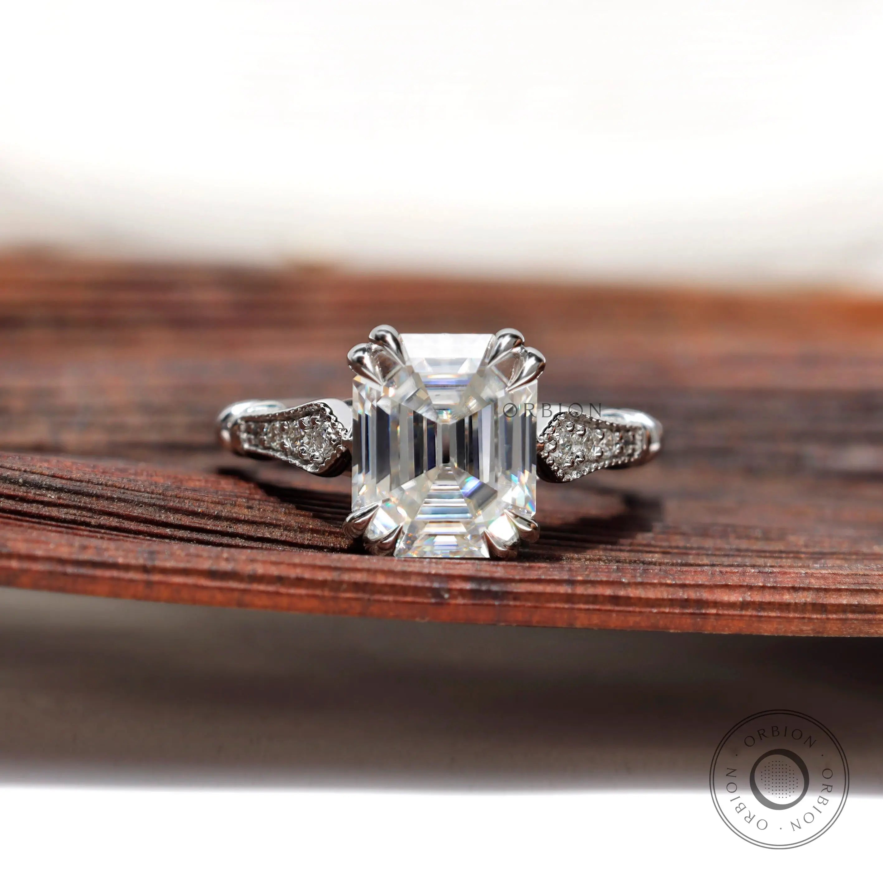 Vintage emerald cut engagement ring with milgrain detail