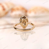 Back view of oval dark champagne moissanite ring bezel structure